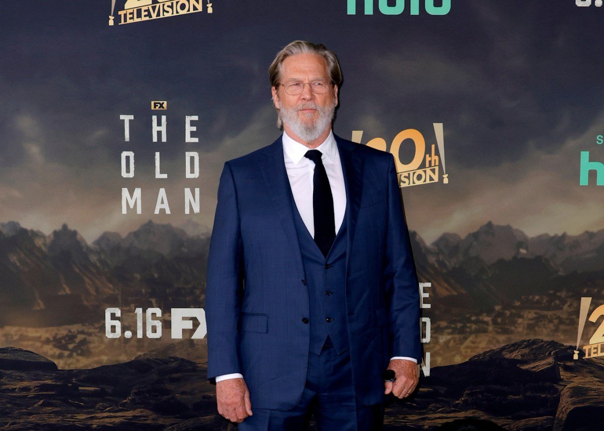 Jeff Bridges in a dark blue suit.