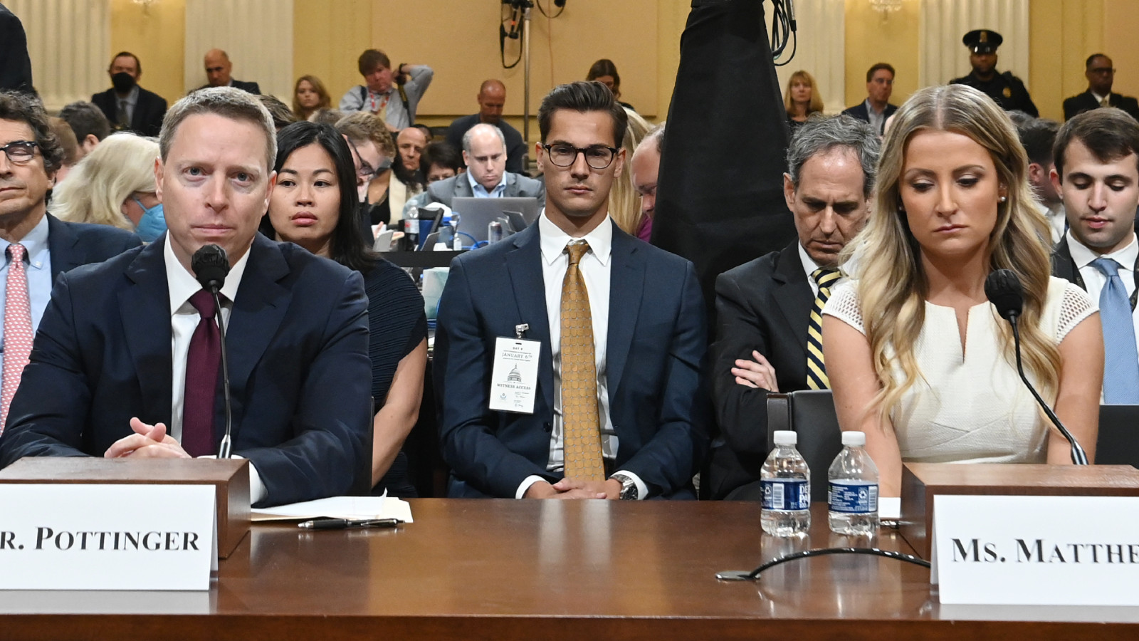 Former National Security Council member Matthew Pottinger and former Deputy White House Press Secretary Sarah Matthews listen during a hearing by House Select Committee to Investigate the January 6th Attack on the U.S. Capitol in the Cannon House Office Building on July 21, 2022 in Washington, DC.