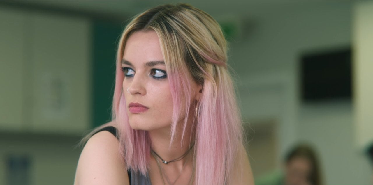 Maeve Wiley glares at an off-screen Otis Milburn in 'Sex Education'