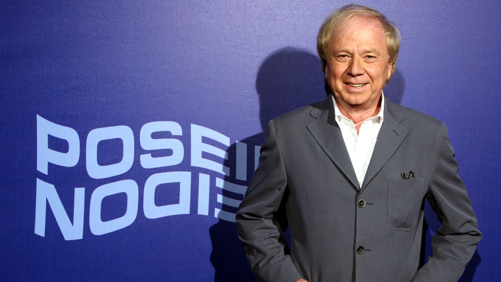 Wolfgang Petersen wears a gray blazer to the premiere of 'Poseidon.'