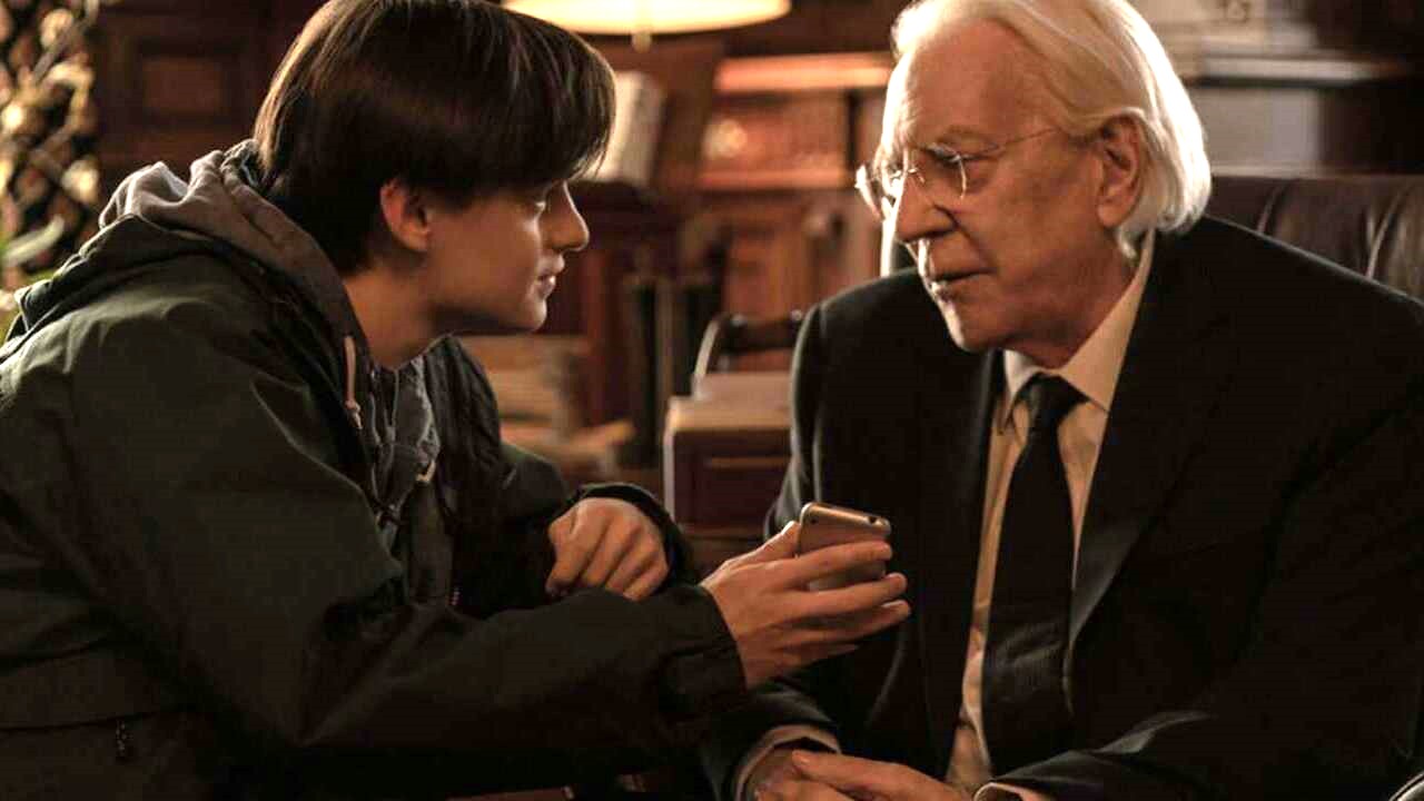 Jaeden Martell and Donald Sutherland in 'Mr. Harrington's Phone'