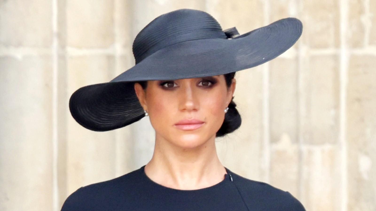 Meghan Markle is seen in an all-black ensemble during Queen Elizabeth II's funeral.