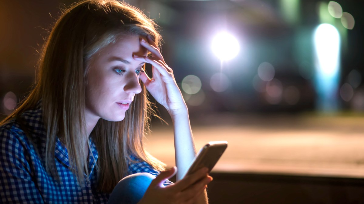 Concerned woman on phone