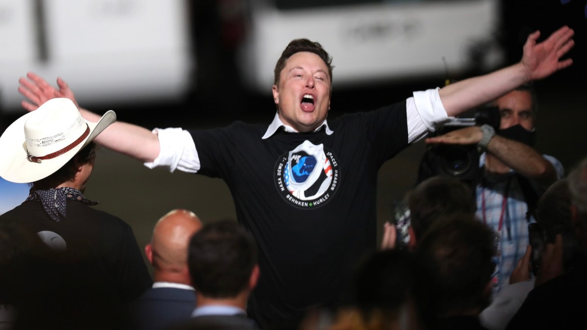 Spacex founder Elon Musk celebrates after the successful launch of the SpaceX Falcon 9 rocket with the manned Crew Dragon spacecraft at the Kennedy Space Center on May 30, 2020 in Cape Canaveral, Florida. Earlier in the day NASA astronauts Bob Behnken and Doug Hurley lifted off an inaugural flight and will be the first people since the end of the Space Shuttle program in 2011 to be launched into space from the United States.