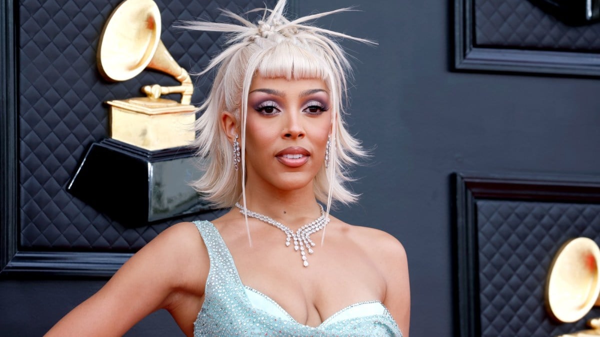 Doja Cat strikes a pose at a red carpet event.