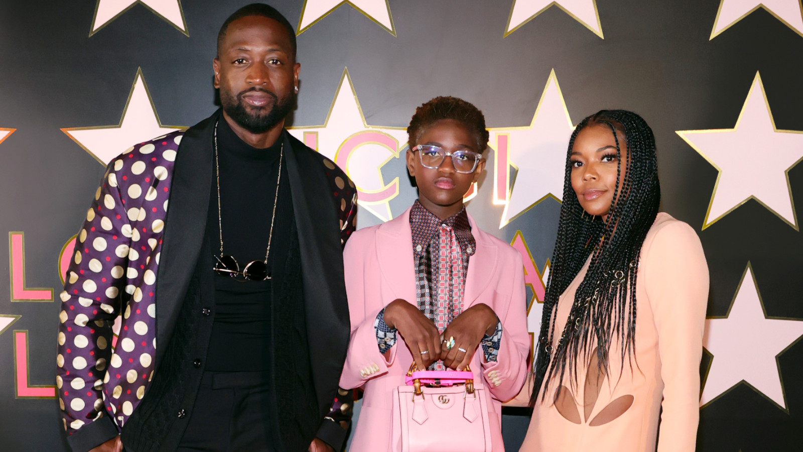 Dwyane Wade, Zaya Wade, and Gabrielle Union arrive at Gucci Love Parade on November 02, 2021 in Los Angeles, California.