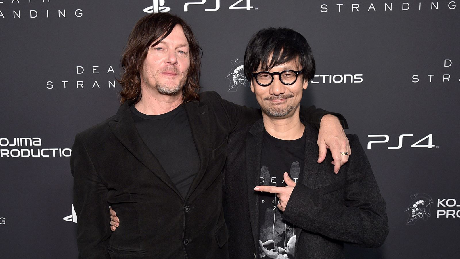 NEW YORK, NEW YORK - NOVEMBER 05: Norman Reedus and Hideo Kojima attend Fractured Worlds: The Art of DEATH STRANDING on November 05, 2019 in New York City.