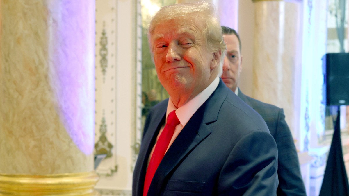 Former U.S. President Donald Trump walks away after speaking to the media during an election night event at Mar-a-Lago on November 08, 2022 in Palm Beach, Florida.