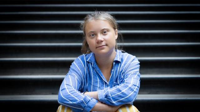 Climate activist Greta Thunberg sits for a photo on the steps of the Museum’s central Hintze Hall at Natural History Museum on June 27, 2022 in London, England. Thunberg teamed up with the Natural History Museum to produce an event for school students centred around biodiversity loss, one of the themes of her forthcoming book, The Climate Book.