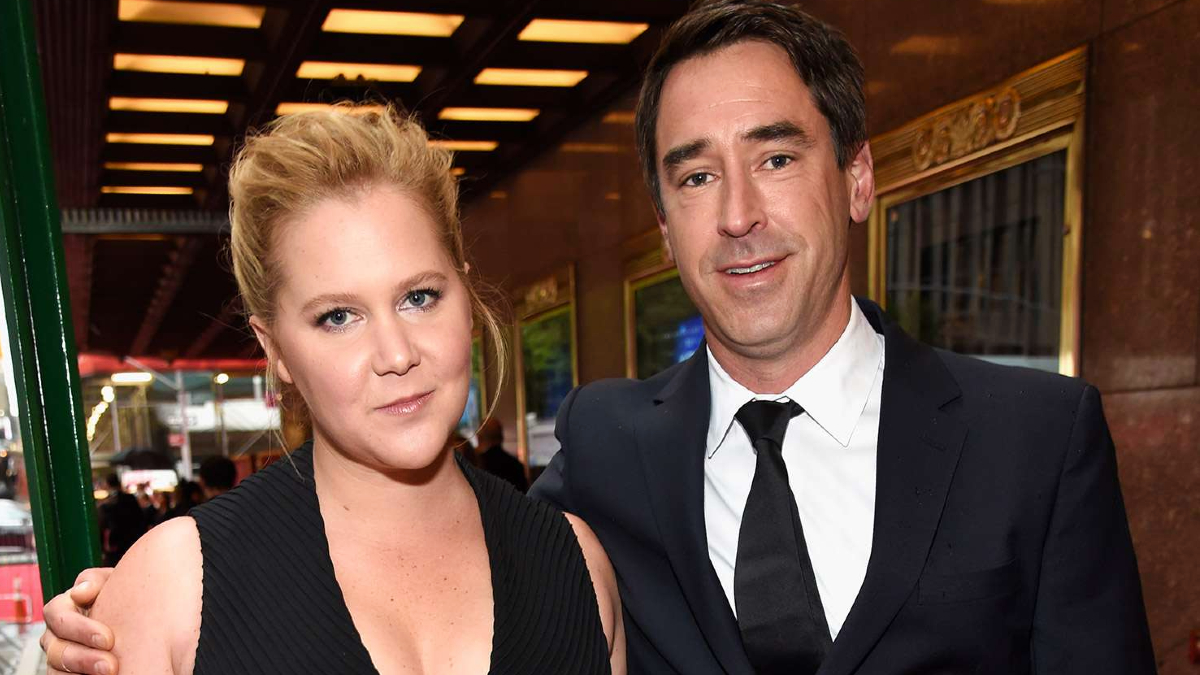 Amy Schumer and Chris Fischer