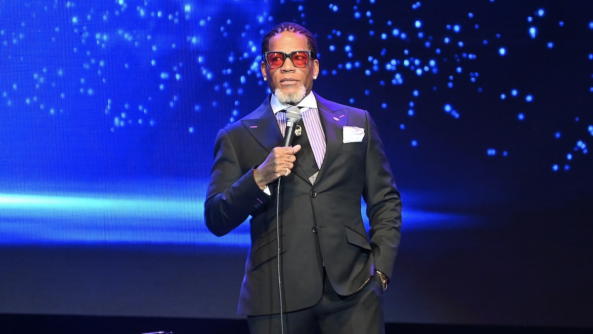 ATLANTA, GEORGIA - DECEMBER 29: Comedian D. L. Hughley performs onstage during the "Straight No Chaser" comedy tour at State Farm Arena on December 29, 2022 in Atlanta, Georgia.