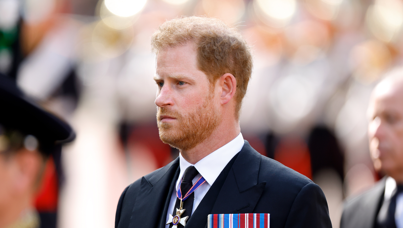 Prince Harry, Duke of Sussex walks behind Queen Elizabeth II's coffin as it is transported on a gun carriage from Buckingham Palace to The Palace of Westminster ahead of her Lying-in-State on September 14, 2022 in London, United Kingdom. Queen Elizabeth II's coffin is taken in procession on a Gun Carriage of The King's Troop Royal Horse Artillery from Buckingham Palace to Westminster Hall where she will lay in state until the early morning of her funeral. Queen Elizabeth II died at Balmoral Castle in Scotland on September 8, 2022, and is succeeded by her eldest son, King Charles III.