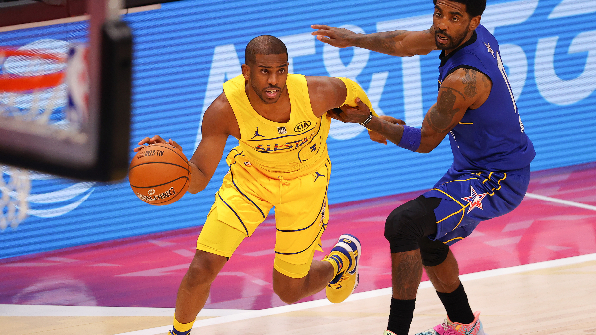 Chris Paul of Team LeBron is defended by Kyrie Irving 