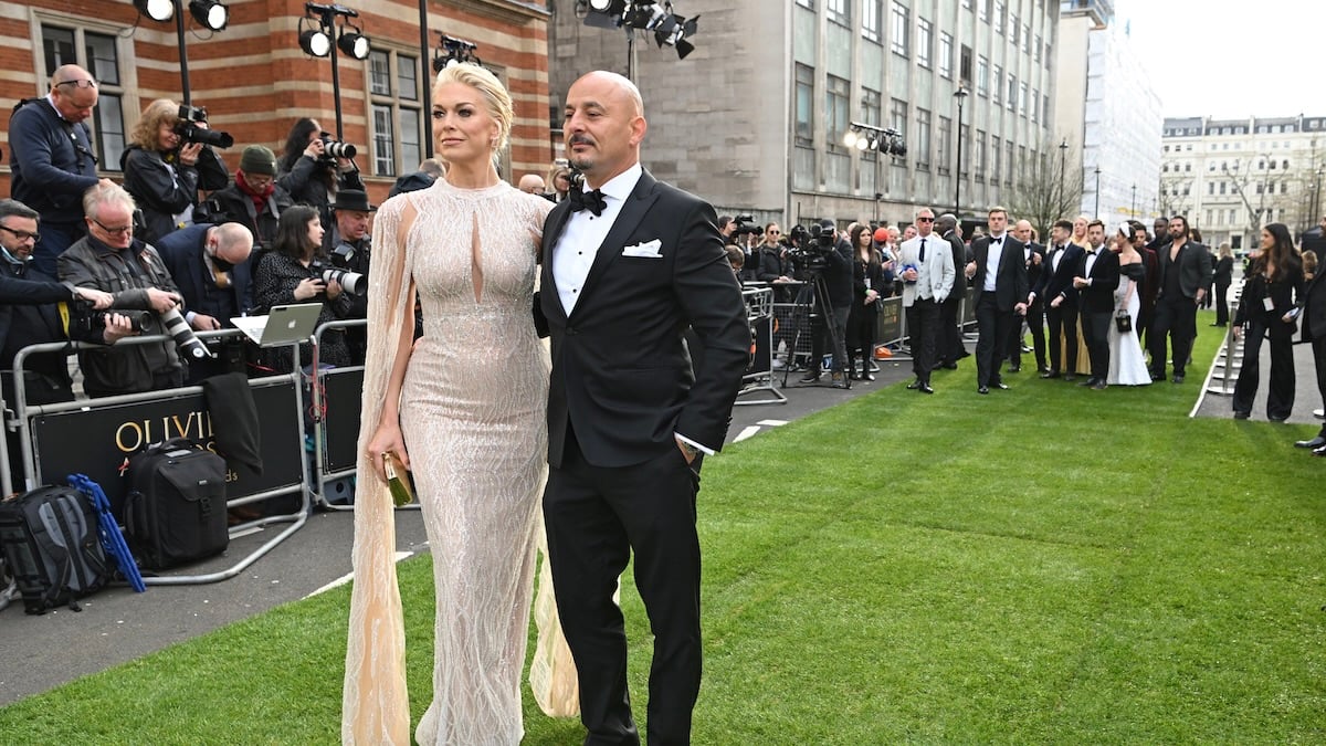 LONDON, ENGLAND - APRIL 10: Hannah Waddingham and Gianluca Cugnetto attends The Olivier Awards 2022 with MasterCard at the Royal Albert Hall on April 10, 2022 in London, England.