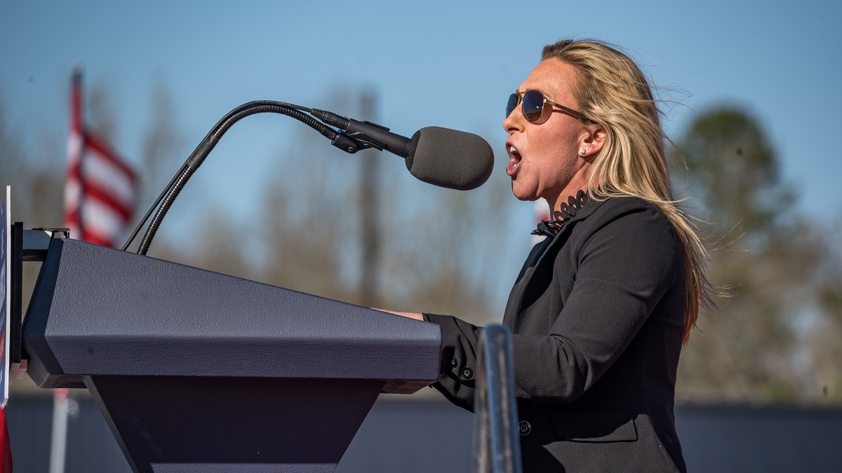 COMMERCE, GA - MARCH 26: Rep. Marjorie Taylor Greene (R-GA) speaks to supporters of former U.S. President Donald Trump at the Banks County Dragway on March 26, 2022 in Commerce, Georgia. This event is a part of Trump's Save America Tour around the United States.