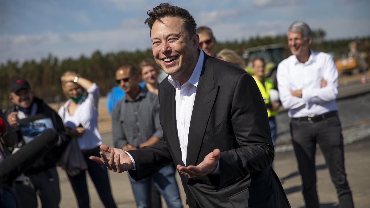 GRUENHEIDE, GERMANY - SEPTEMBER 03: Tesla head Elon Musk talks to the press as he arrives to to have a look at the construction site of the new Tesla Gigafactory near Berlin on September 03, 2020 near Gruenheide, Germany. Musk is currently in Germany where he met with vaccine maker CureVac on Tuesday, with which Tesla has a cooperation to build devices for producing RNA vaccines, as well as German Economy Minister Peter Altmaier yesterday.