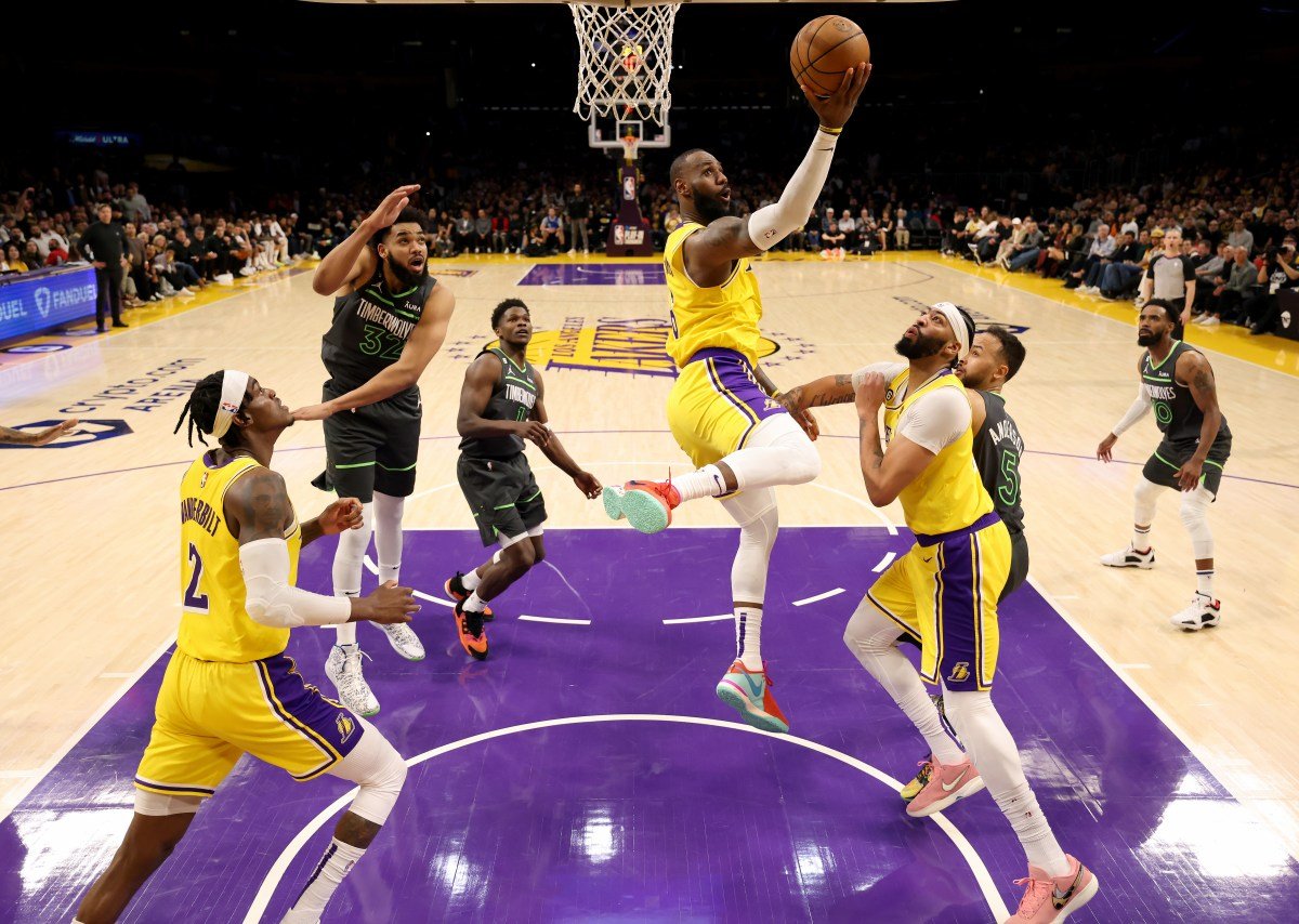 LOS ANGELES, CALIFORNIA - APRIL 11: LeBron James #6 of the Los Angeles Lakers scores on a layup during a 108-102 Los Angeles Lakers win in a play-in tournament game at Crypto.com Arena on April 11, 2023 in Los Angeles, California.