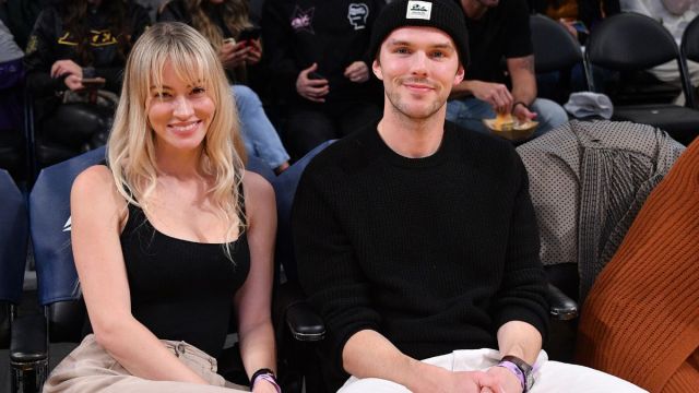 LOS ANGELES, CALIFORNIA - JANUARY 15: Nicholas Hoult and Bryana Holly attend a basketball game between the Los Angeles Lakers and the Philadelphia 76ers at Crypto.com Arena on January 15, 2023 in Los Angeles, California.