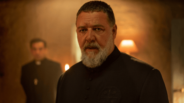 Gabriele Amorth (Russell Crowe) stunned by the sight of something off-screen in 'The Pope's Exorcist'