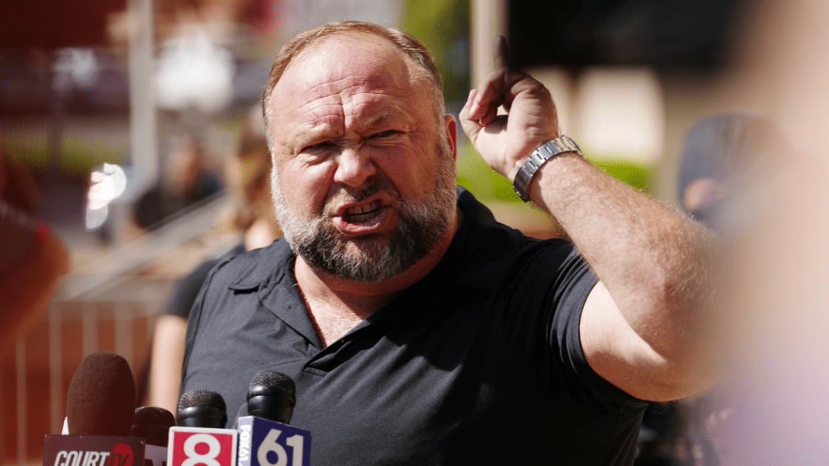 WATERBURY, CONNECTICUT - SEPTEMBER 21: InfoWars founder Alex Jones speaks to the media outside Waterbury Superior Court during his trial on September 21, 2022 in Waterbury, Connecticut. Jones is being sued by several victims' families for causing emotional and psychological harm after they lost their children in the Sandy Hook massacre. A Texas jury last month ordered Jones to pay $49.3 million to the parents of 6-year-old Jesse Lewis, one of 26 students and teachers killed in the shooting in Newtown, Connecticut.