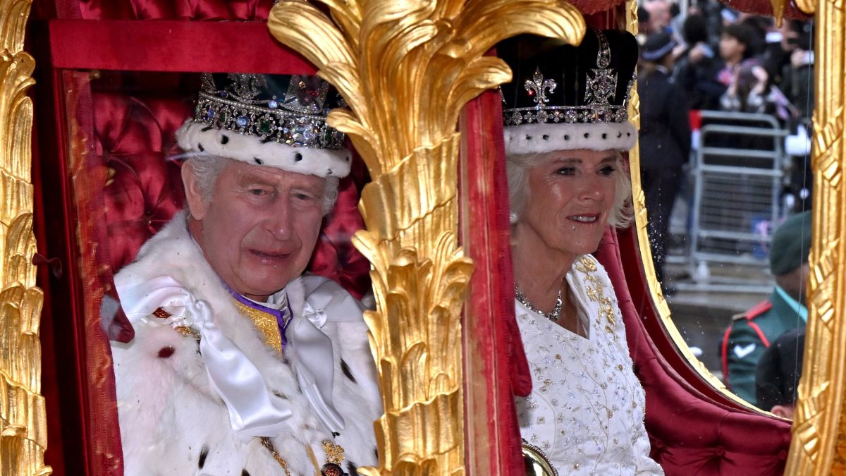 King Charles III and Queen Camilla travel along Whitehall during the Coronation of King Charles III and Queen Camilla on May 06, 2023 in London, England. The Coronation of Charles III and his wife, Camilla, as King and Queen of the United Kingdom of Great Britain and Northern Ireland, and the other Commonwealth realms takes place at Westminster Abbey today. Charles acceded to the throne on 8 September 2022, upon the death of his mother, Elizabeth II. (Photo by Anthony Devlin/Getty Images)