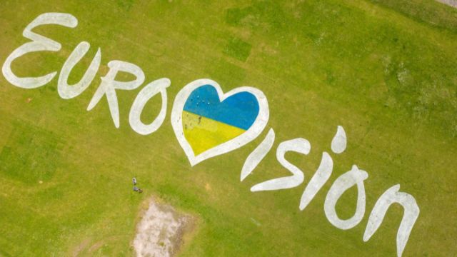 LIVERPOOL, ENGLAND - MAY 11: A giant mural of the Eurovision 2023 logo incorporating the Ukrainian flag adorns the dips at New Brighton on May 11, 2023 in Liverpool, England. The UK is hosting on behalf of Ukraine, whose entry won last year's song contest, but could not host this year's contest due to the war.
