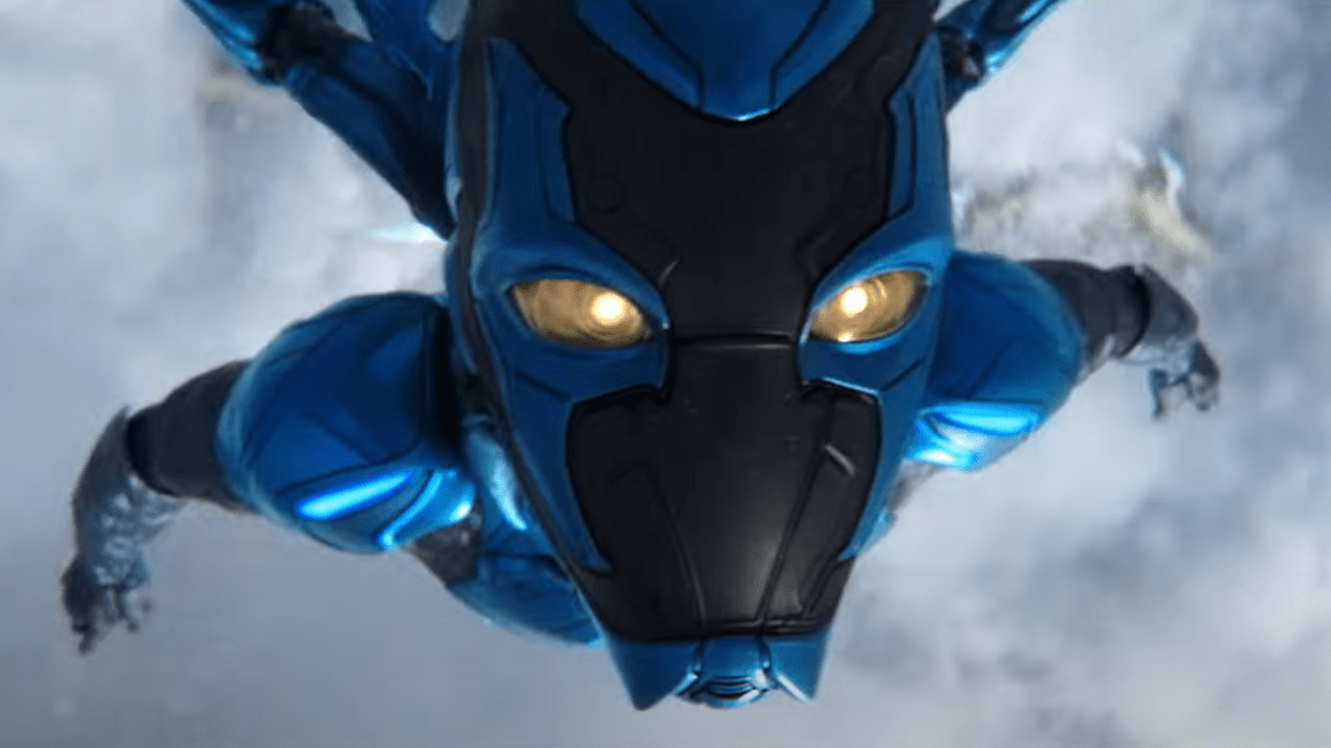 Blue Beetle flying directly at the screen