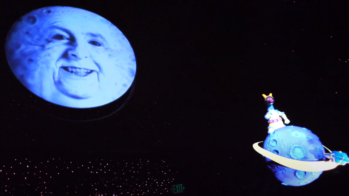 Figment the Dragon and Eric Idle as the moon