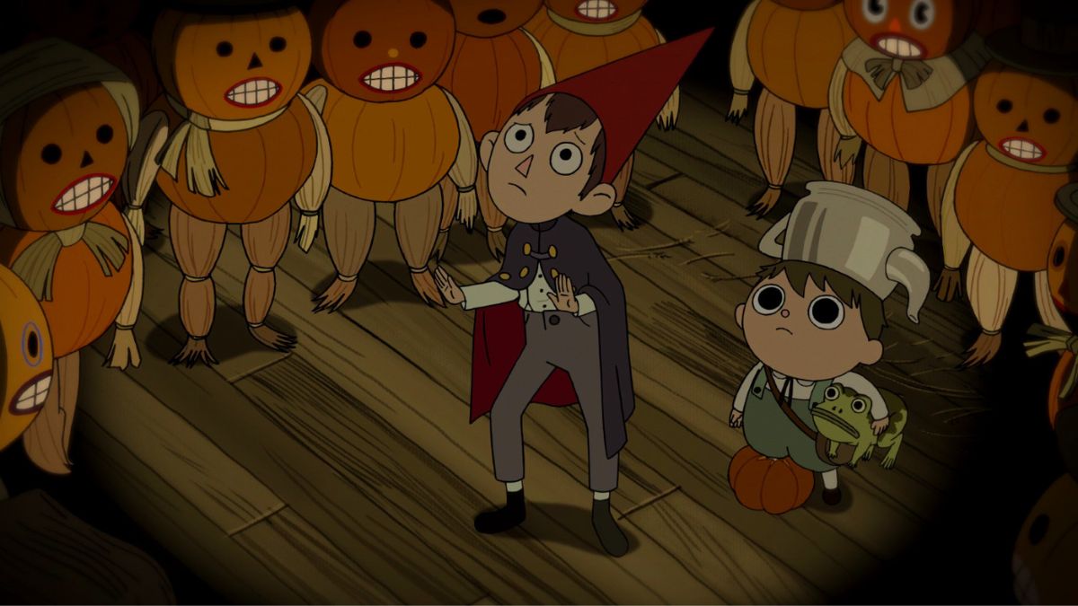 Skeleton pumpkin guys surrounding Wirt and Greg.