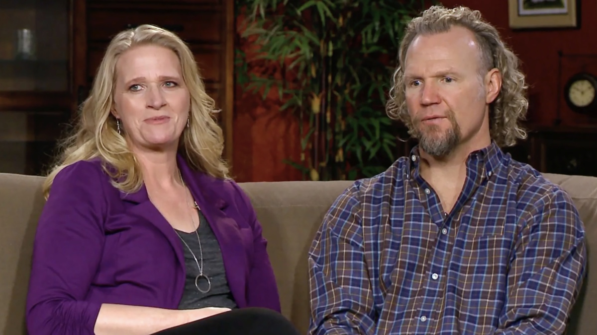 Christine and Kody Brown sit together in confessional