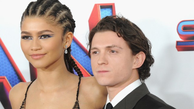 Zendaya and Tom Holland attend Sony Pictures' "Spider-Man: No Way Home" Los Angeles Premiere held at The Regency Village Theatre on December 13, 2021