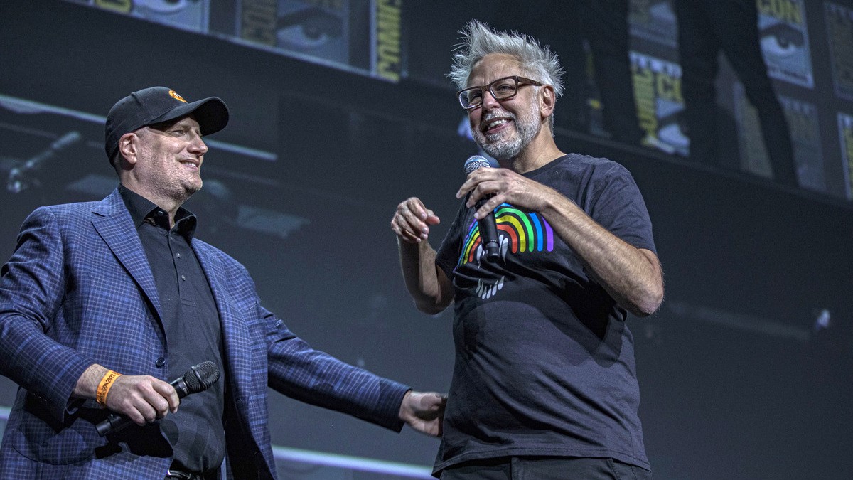 Kevin Feige (L) and James Gunn speak onstage at the Marvel Cinematic Universe Mega-Panel during 2022 Comic-Con International Day 3