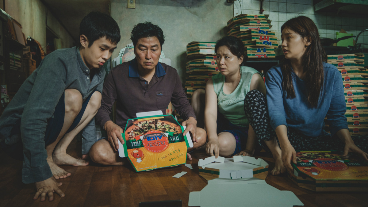 Family from "Parasite" gathered on the floor