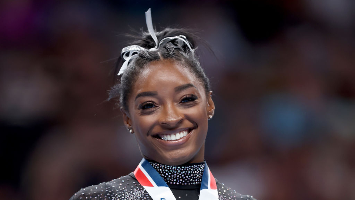 Simone Biles celebrates after placing first in the floor exercise competition on day four of the 2023 U.S. Gymnastics Championships at SAP Center on August 27, 2023 in San Jose, California. 