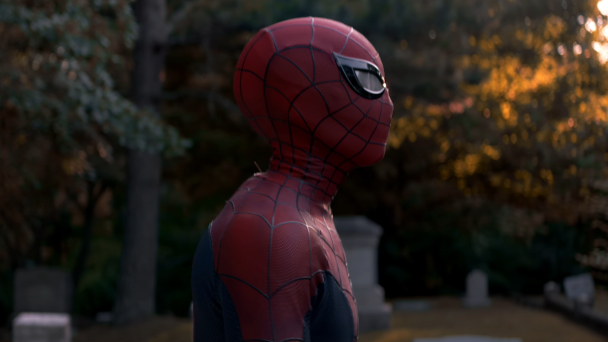 Spider-Man walking through a graveyard in 'Spider-Man: Lotus'