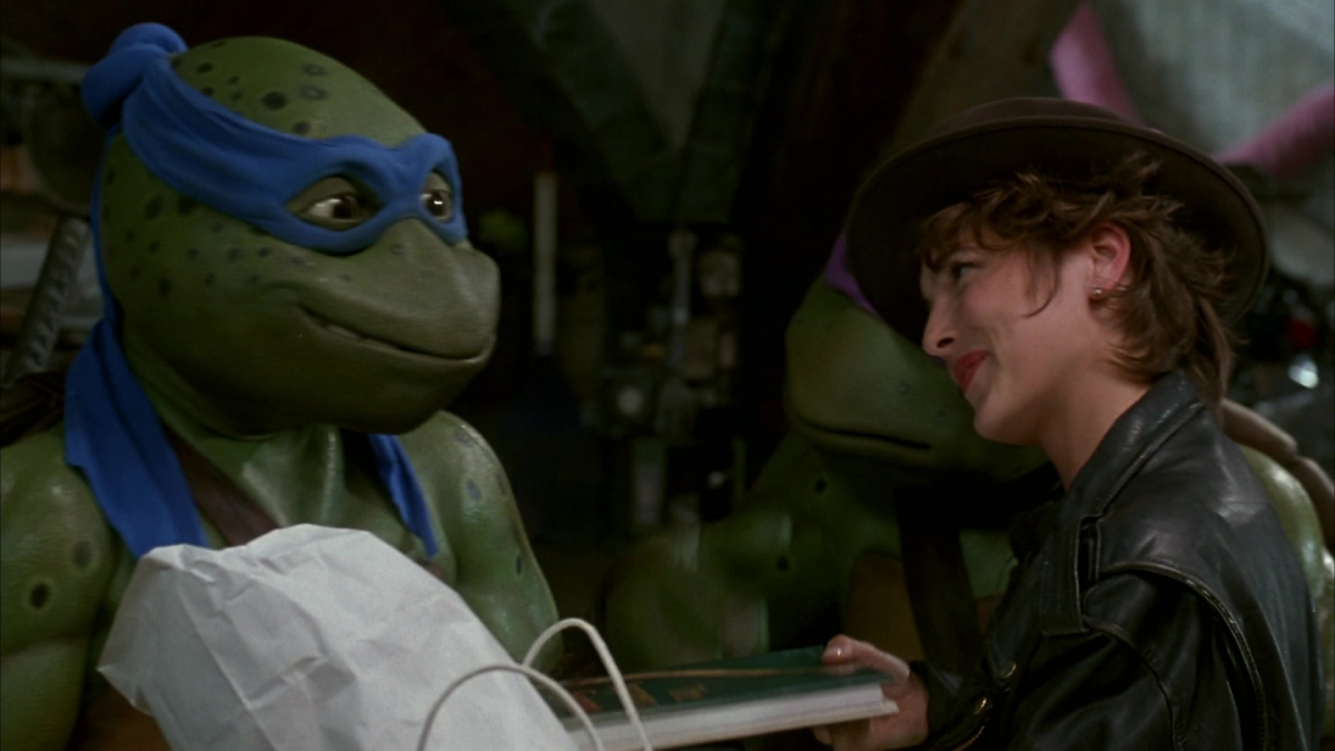 Leonardo smiling super weirdly at April O'Neil