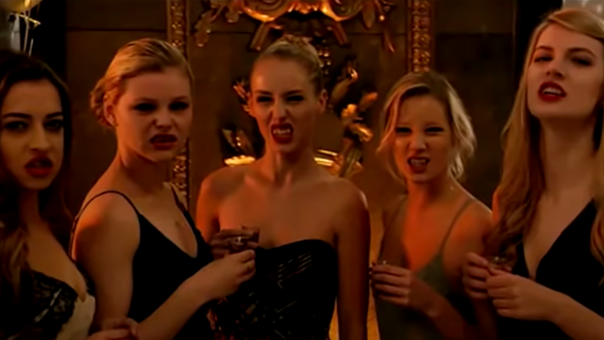 Mean vampire girls making faces.