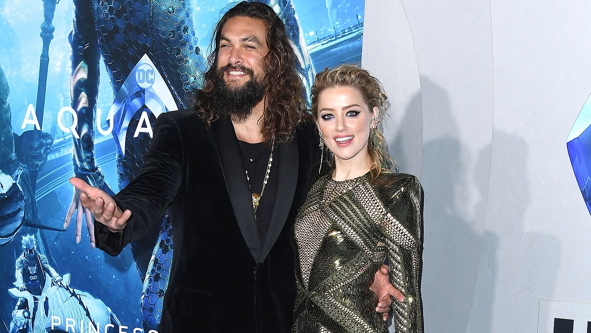 HOLLYWOOD, CA - DECEMBER 12: Jason Momoa, Amber Heard arrives at the Premiere Of Warner Bros. Pictures' "Aquaman" at TCL Chinese Theatre on December 12, 2018 in Hollywood, California.