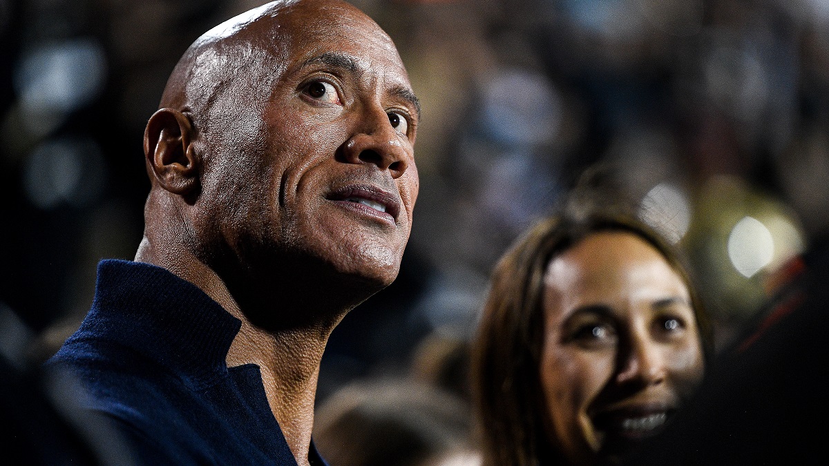 BOULDER, CO - SEPTEMBER 16: Dwayne The Rock Johnson stands on the sideline in the first half of a game between the Colorado Buffaloes and the Colorado State Rams at Folsom Field on September 16, 2023 in Boulder, Colorado.