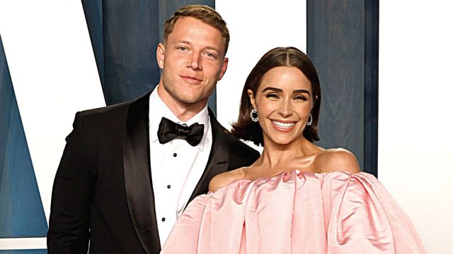 BEVERLY HILLS, CALIFORNIA - MARCH 27: (L-R) Christian McCaffrey and Olivia Culpo attend the 2022 Vanity Fair Oscar Party hosted by Radhika Jones at Wallis Annenberg Center for the Performing Arts on March 27, 2022 in Beverly Hills, California.
